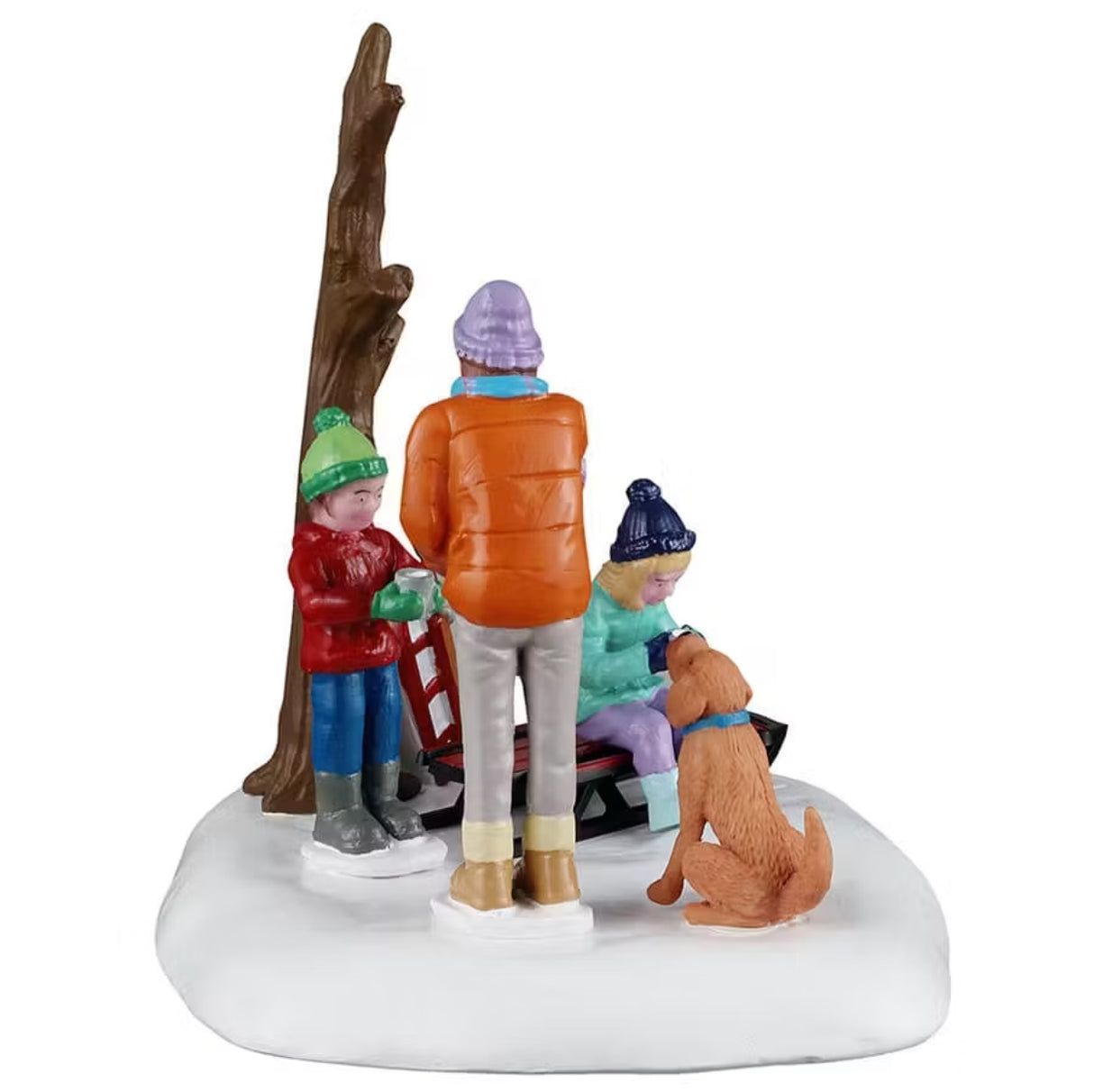 This is another view of this table accent. The boy is wearing a green winter hat and gloves, a red jacket, blue jeans and gray boots. The mom is wearing a purple winter hat, an orange jacket, gray pants and brown boots. The daughter is wearing a dark blue winter hat and gloves, a teal jacket, purple pants and light blue boots.