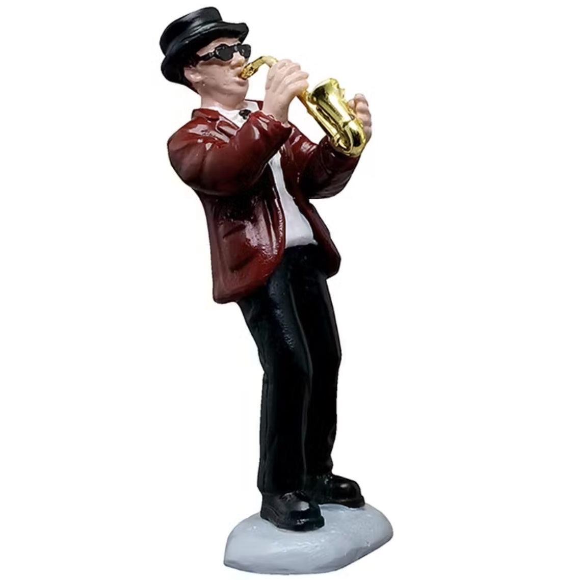This figurine is a man playing the saxophone. He's wearing a black top hat, black sunglasses, a maroon colored suit jacket, a white shirt and black pants.