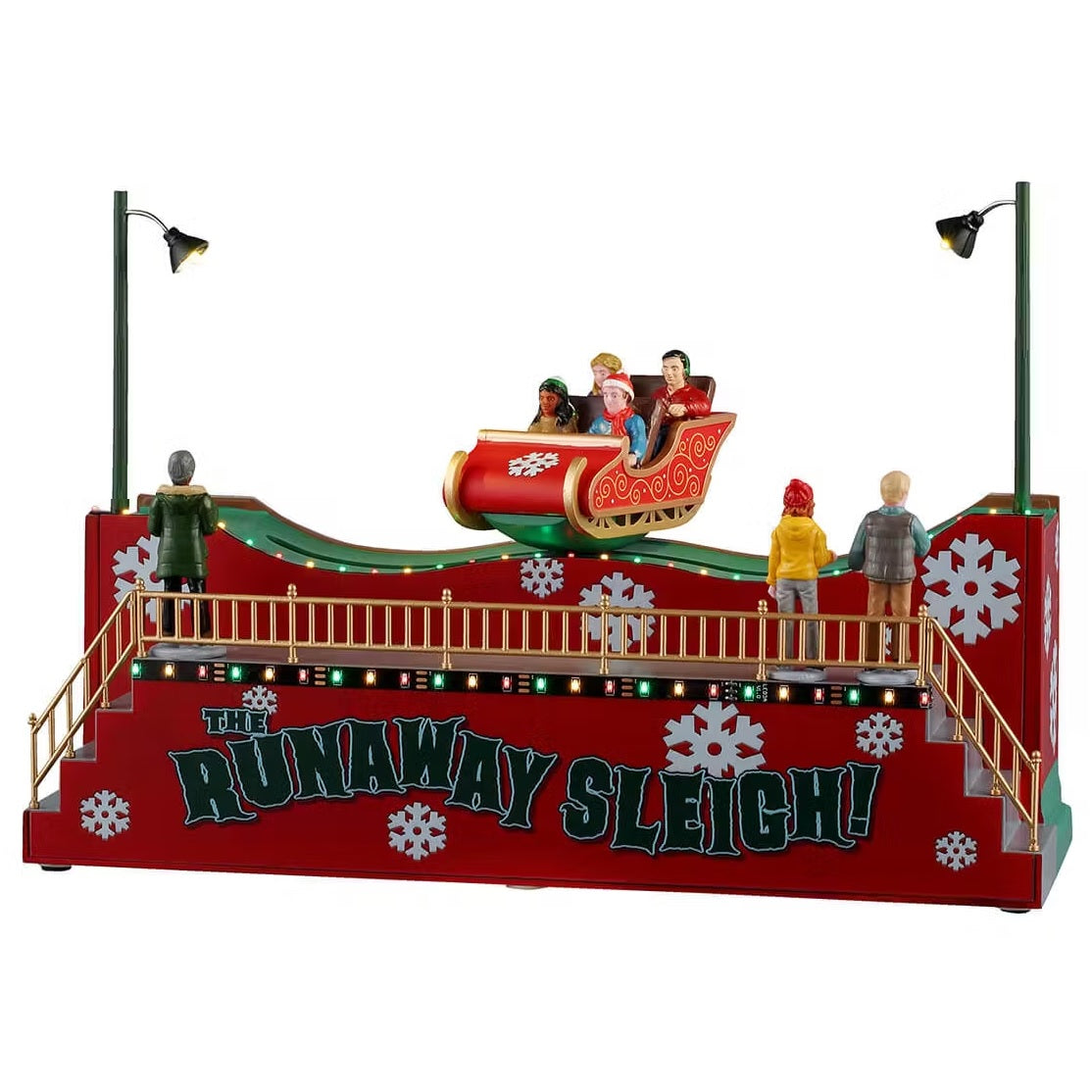 This is a Lemax table accent designed to look like a carnival ride. The ride is a sleigh that goes back and forth and spins. There are snowflakes on the wall.