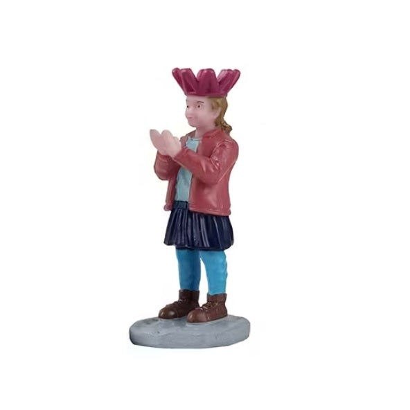 This figurine shows a girl wearing a pink balloon crown and clapping her hands.