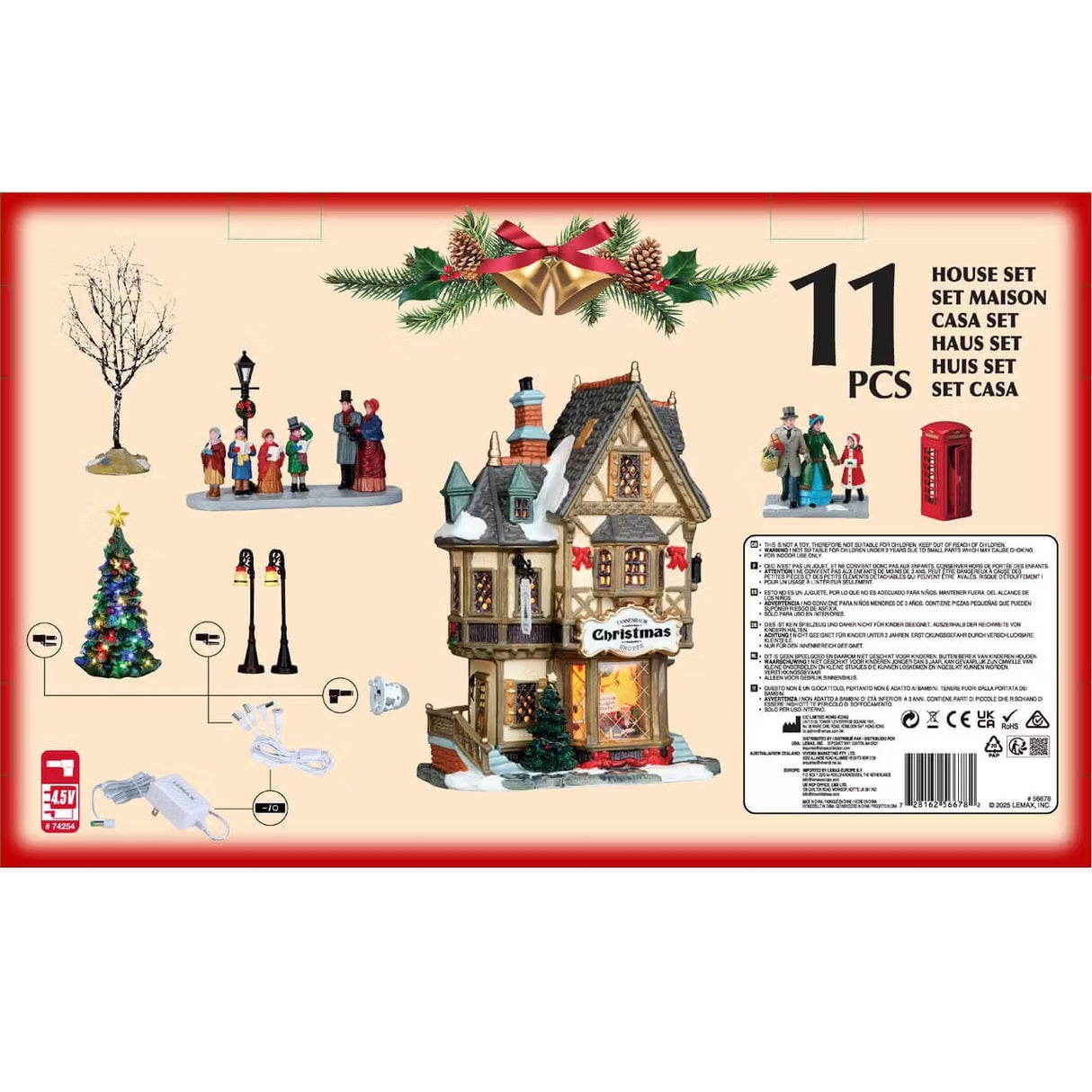 This is the back of the box showing all the items that are included. There are two trees, two table accents, two lamp posts, one building, a red telephone booth, a light and two adaptors.