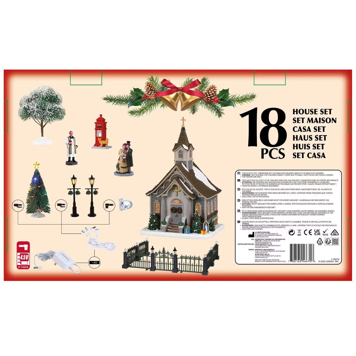 This is the back of the box showing what comes inside the set: two trees, three figurines, two lamp posts, a fence, a church, a light and an adaptor.