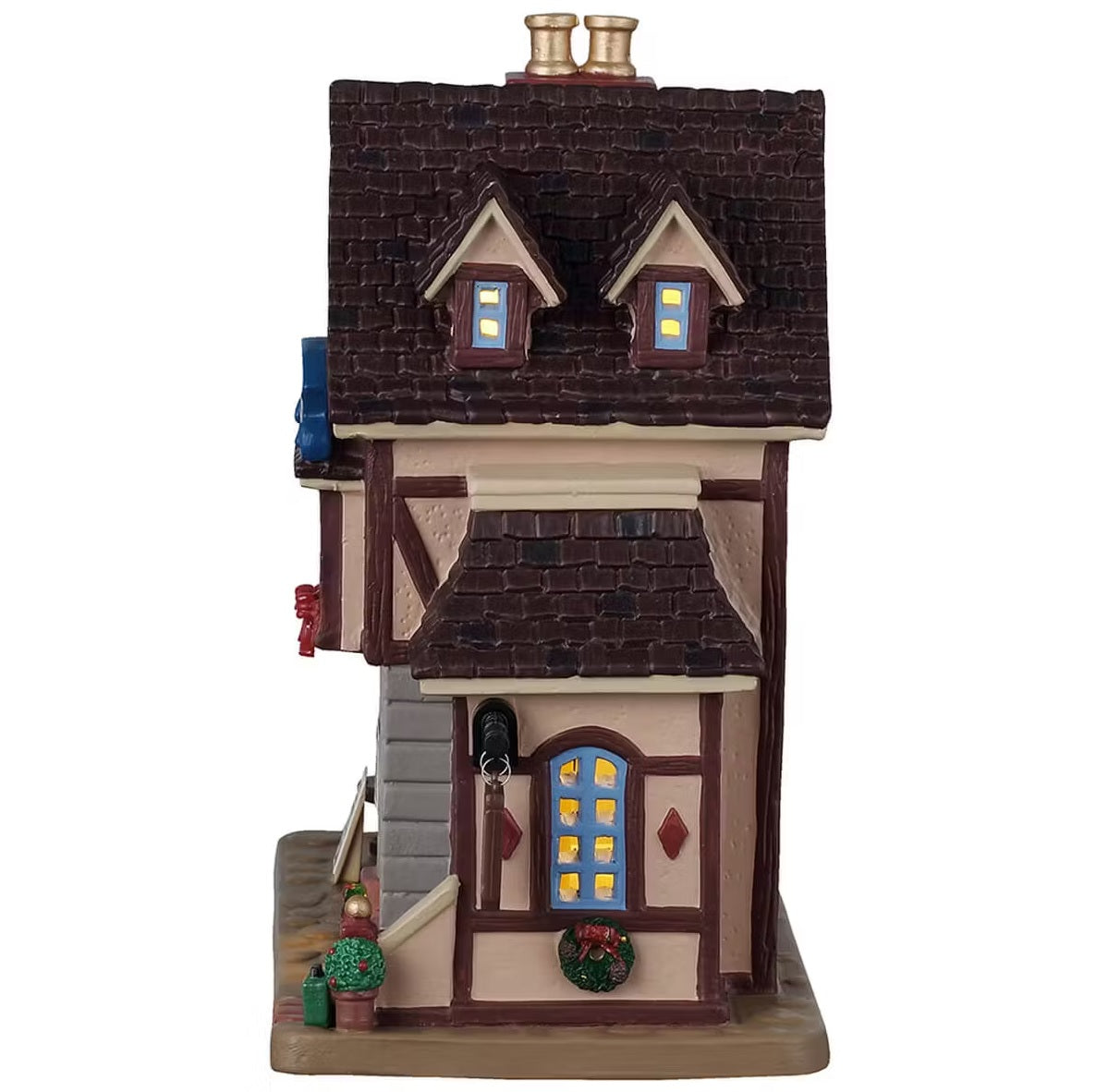 This is the side of the building. There are three windows with light shining through.