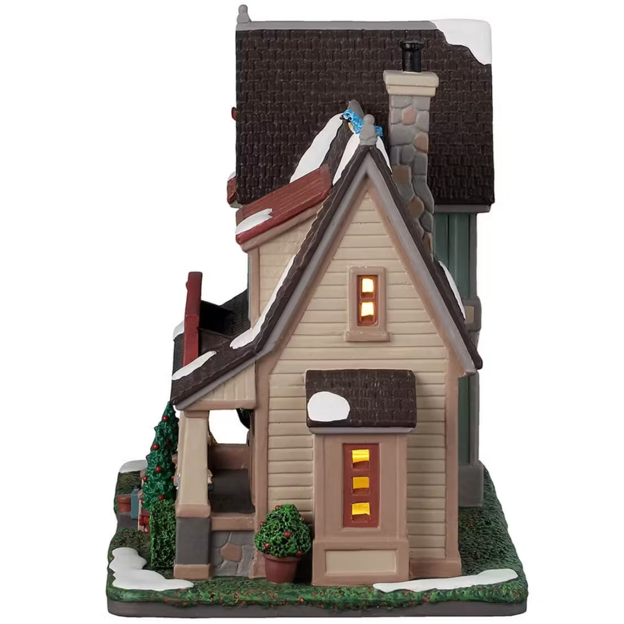 This is the other side of the building. You can see a blue bird on the roof near the stone chimney.