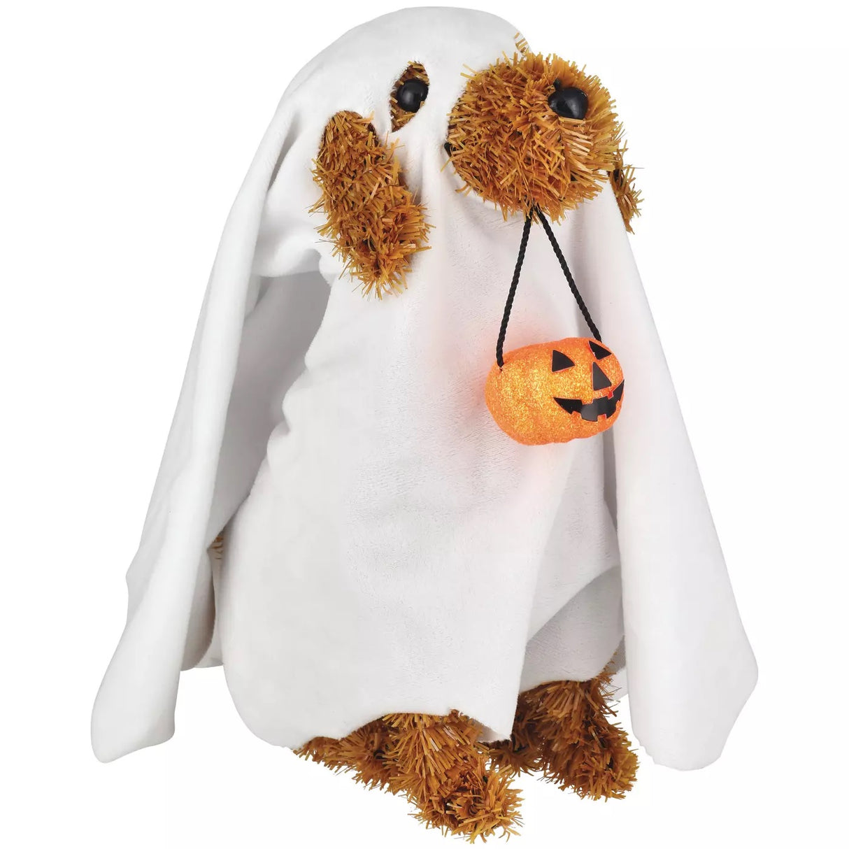 This is a side profile of this tabletop decoration is a brown tinsel dog with black eyes and a black nose. He's wearing a soft, white sheet with eyeholes and a hole cut for his snout - so he looks like a ghost! He's holding a pail in his mouth that's shaped like a jack-o-lantern.
