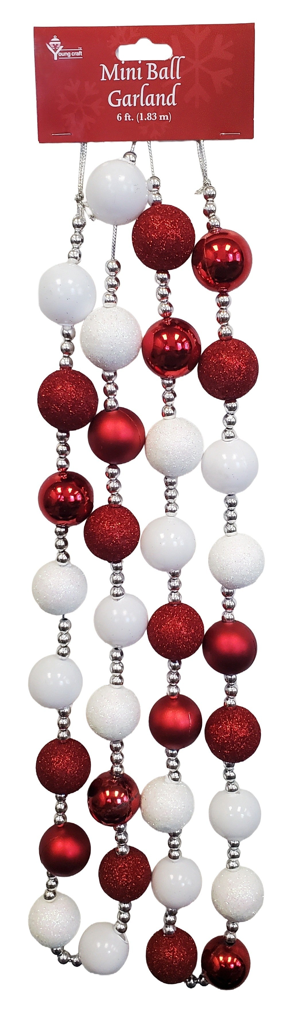 This image shows the mini ball garland on a white background. The garland consists of medium sized beads in red and white, interspersed with small silver beads. The medium sized beads are matte white, white glitter, matte red, shiny red and red glitter.
