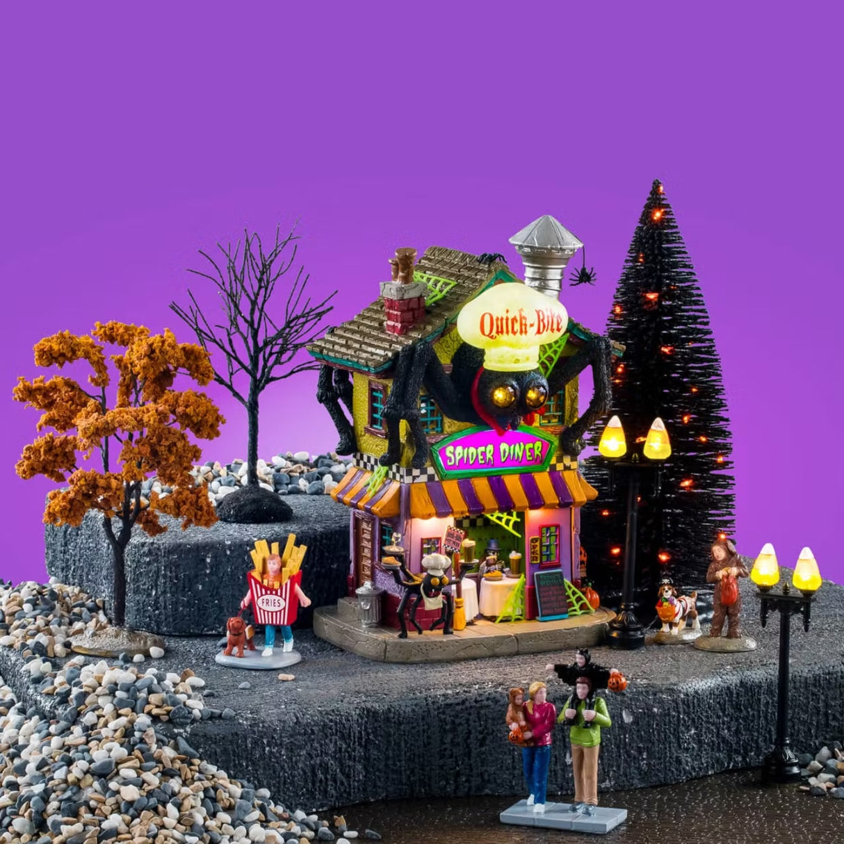 This image shows the House Set on display with a purple background. This image can be used as inspiration for how to set these items.