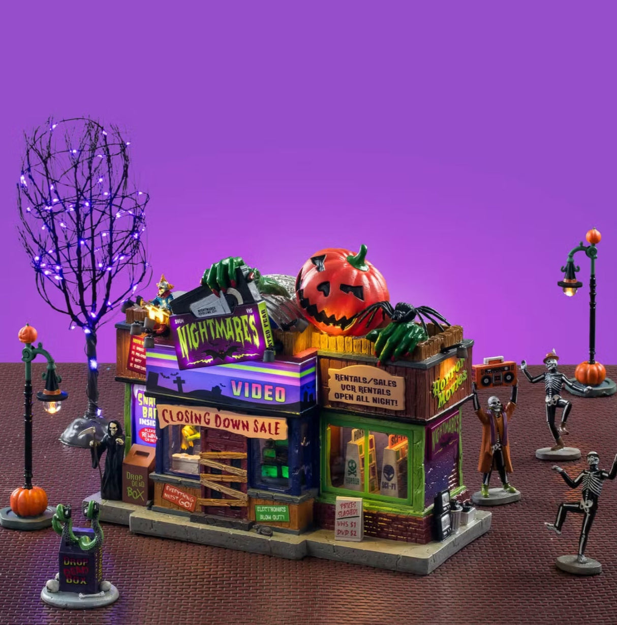 This image shows the House Set on display with a purple background. This image can be used as inspiration for how to set these items.