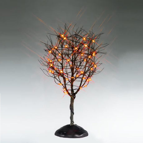 This is a Lemax Spooky Town tree that has a twisted trunk, bunches of bare branches and purple lights. This is showing it on a gray background.