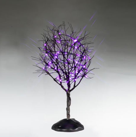 This is a Lemax Spooky Town tree that has a twisted trunk, bunches of bare branches and purple lights. This is showing it on a gray background.