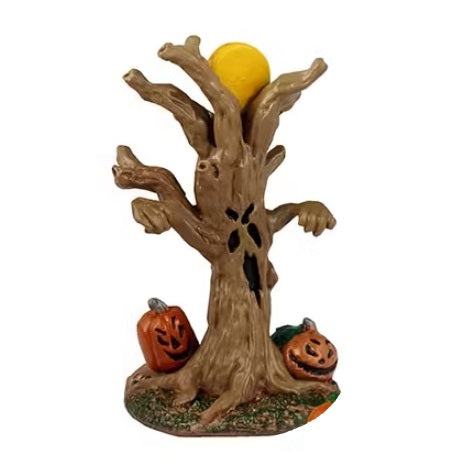 This is the creepy looking, dead tree with a spooky face carved into it. There are two jack-o-lanterns at the base and the yellow moon up top.