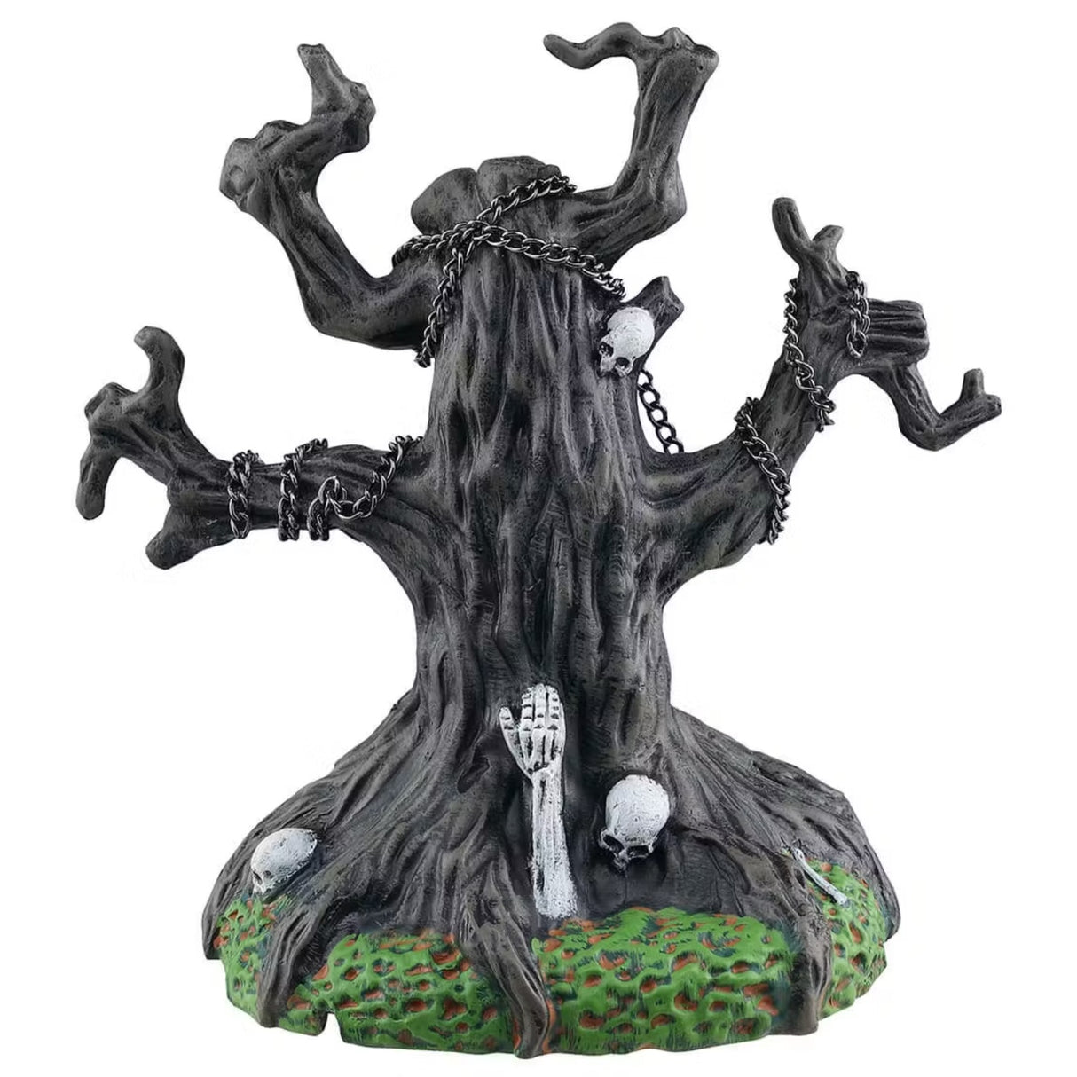 This is a different angle of the tree with no leaves on the branches. There are chains and skulls wrapped around a few branches. At the base of the tree, there's a skeleton arm reaching out.