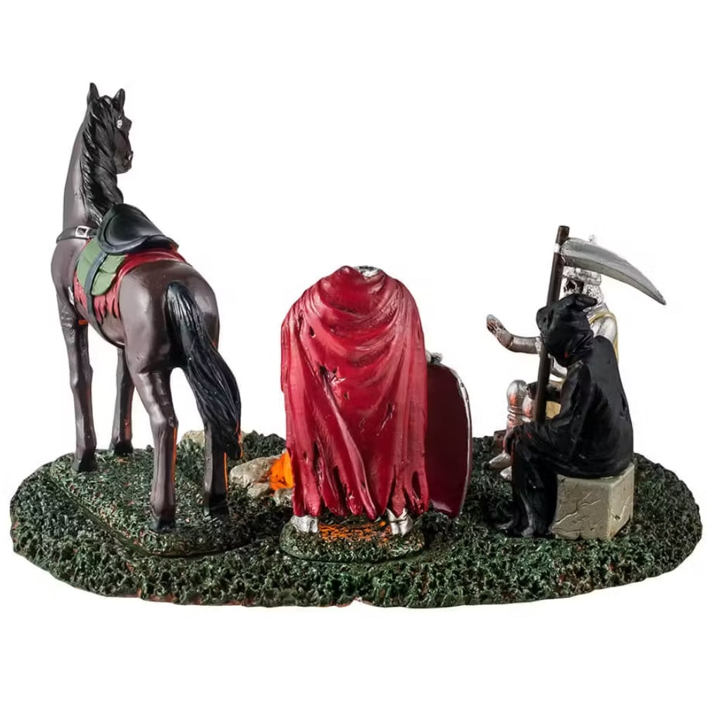 This is a different angle - This is a Lemax Spooky Town table piece that's designed to look like a knight, a Grim Reaper, the Headless Horseman and a horse standing around a campfire.