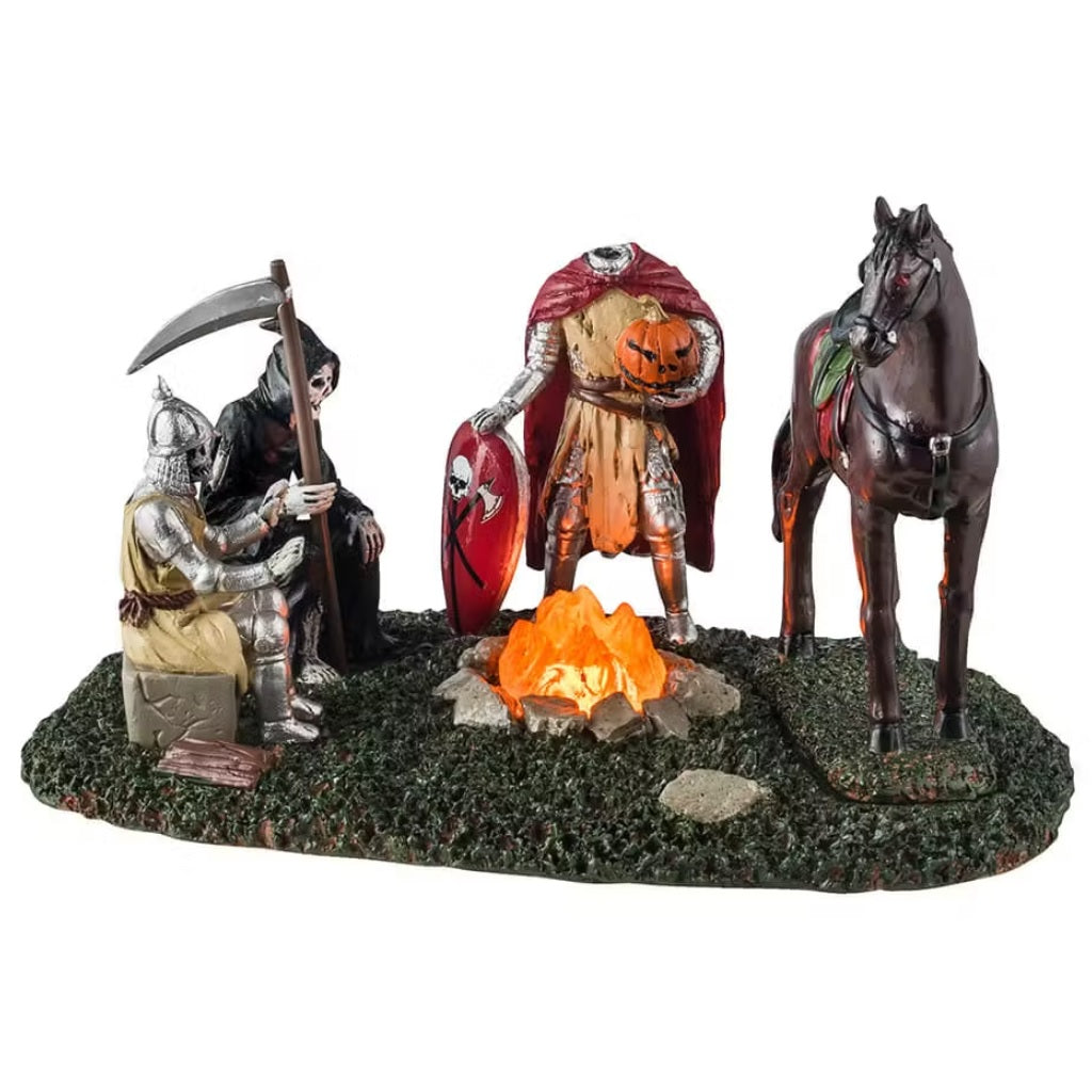 This is a Lemax Spooky Town table piece that's designed to look like a knight, a Grim Reaper, the Headless Horseman and a horse standing around a campfire.