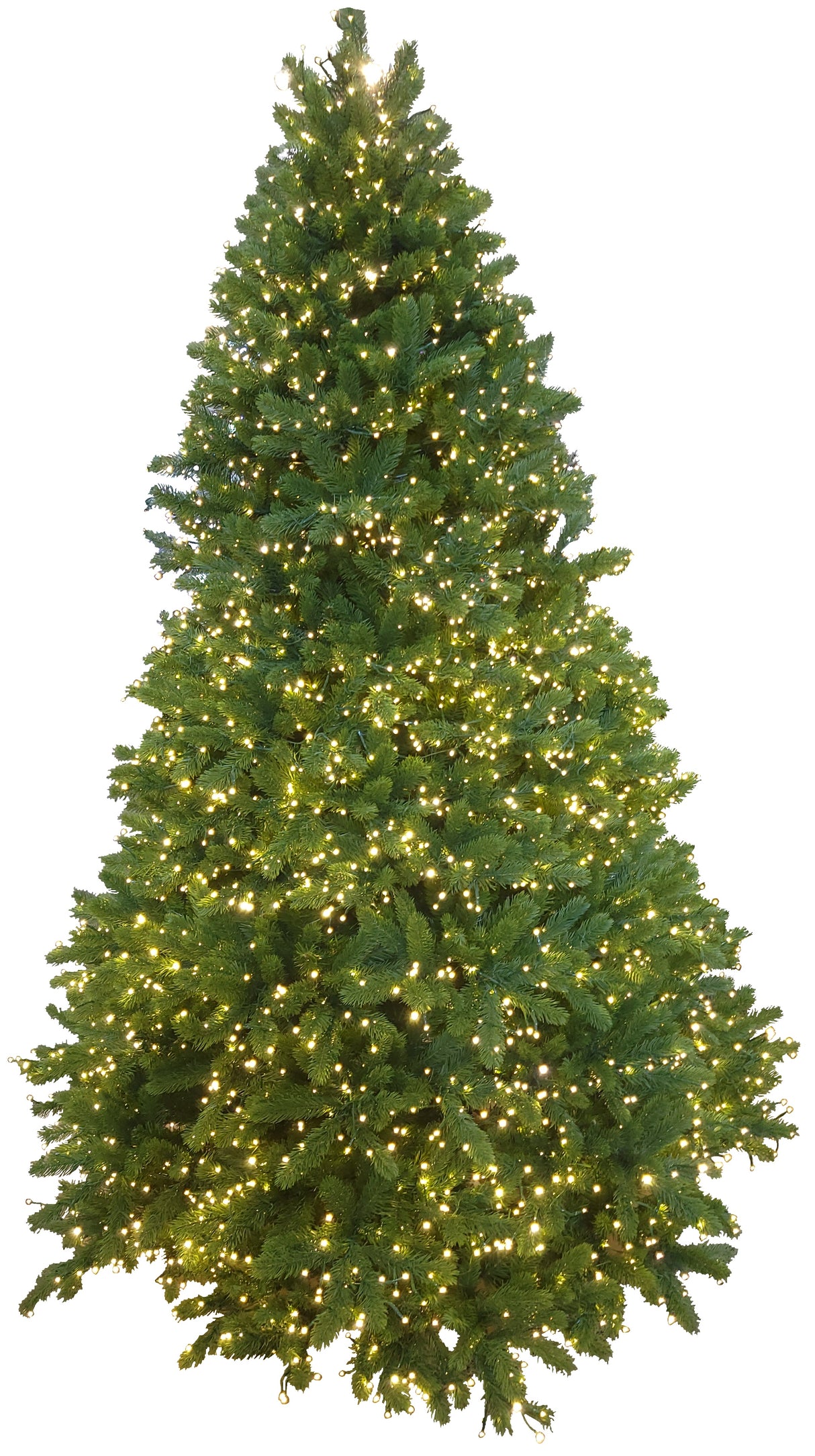 This image shows this specific 7.5 ft. artificial tree with the warm white lights on.