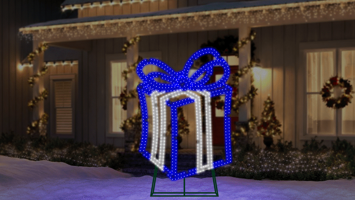 This moving image shows the Blue and Pure White LED present twinkling on the snowy front lawn of a house decorated for Christmas.