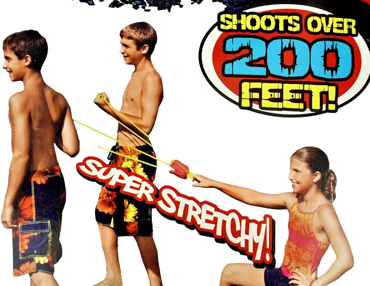 This image shows three kids using the launcher to shoot a yellow balloon.