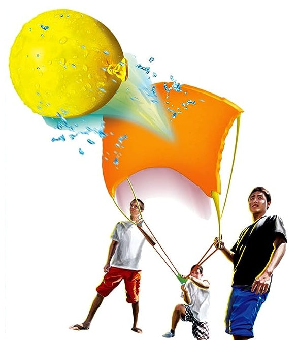 This image shows three people using the slingshot to shoot a water balloon.