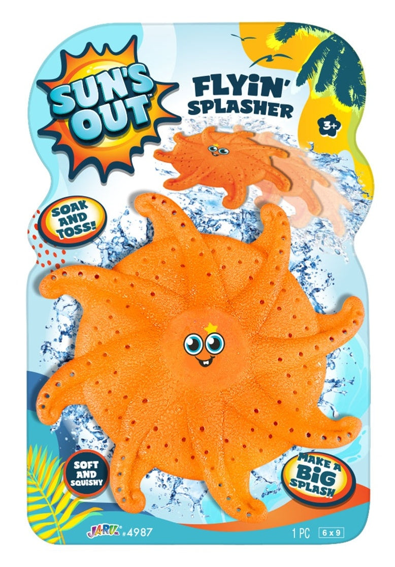 This image shows the orange color option for this flyin' splasher pool toy. The packaging reads "Sun's Out Flyin' Splasher. Soak and toss! Make a big splash! Soft and squishy." This orange option features a face in the middle. It has two large, curious eyes and a small goofy smile. There's also a small yellow star above the right eye.