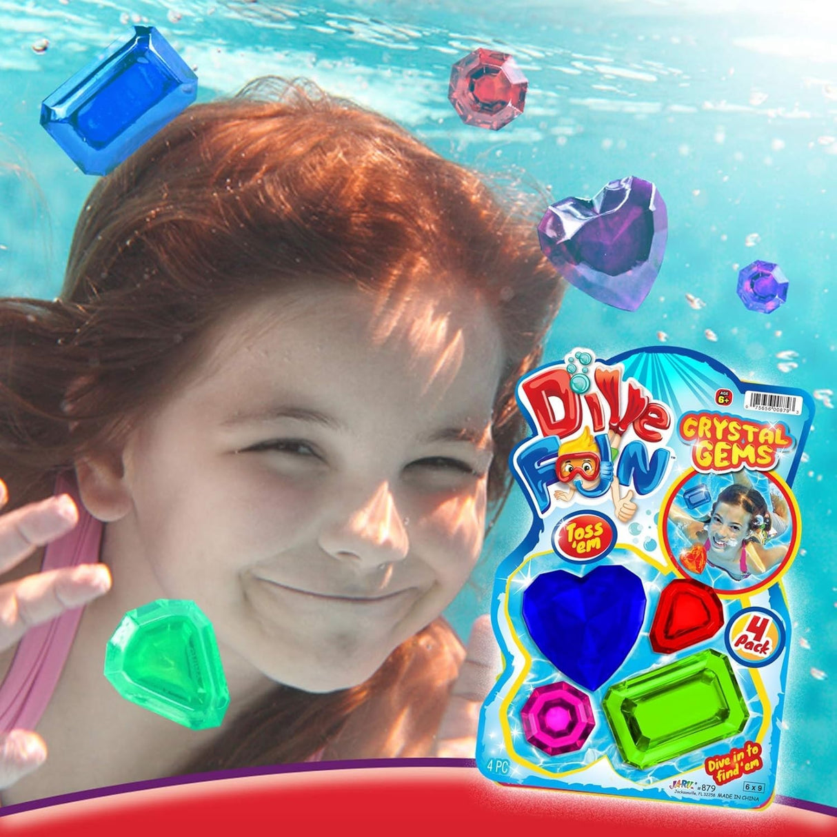 This image shows a young girl underwater surrounded by the dive toys.