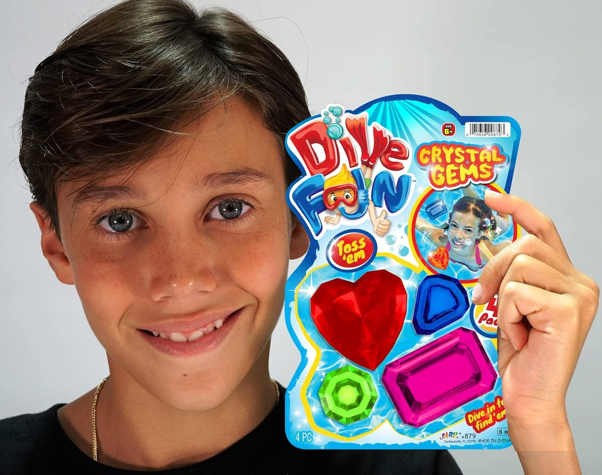 This image shows a young boy holding up the packaging of these dive toys.