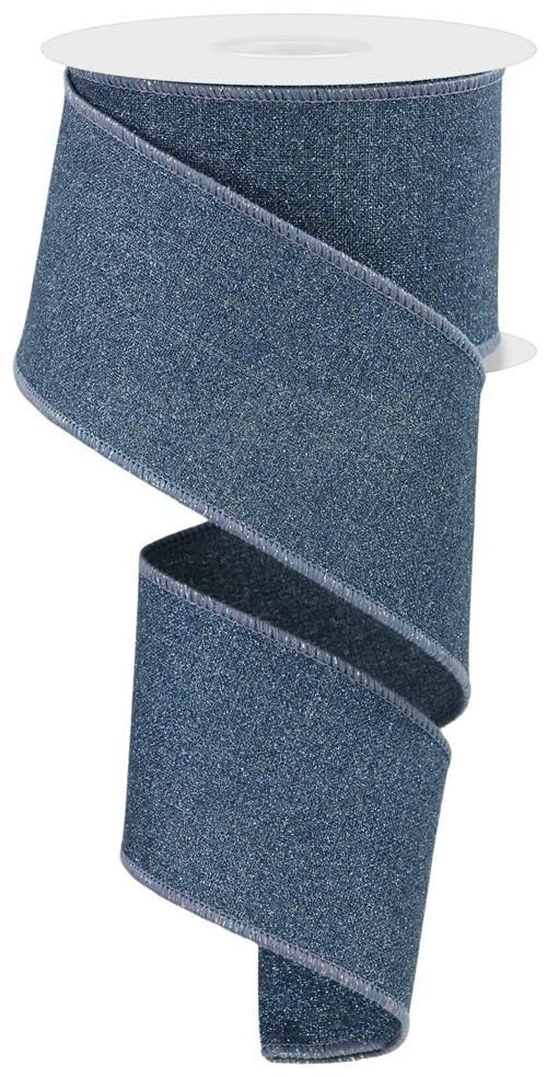 This image shows the smoke blue colored glitter ribbon with wired edges. It sort of looks like it's made of glitter denim.