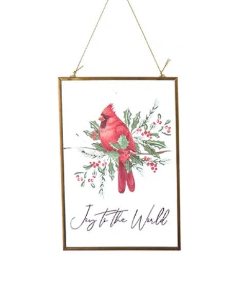 This ornament reads "Joy to the World" and features a cardinal among holly leaves and berries.
