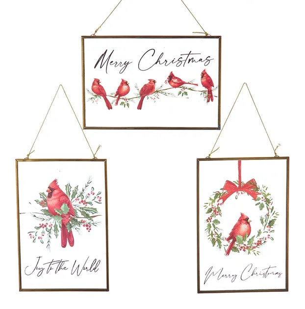 Glass Christmas ornaments that feature cardinals.