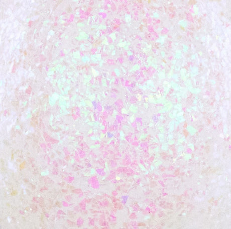 This is an up close view of the iridescent confetti glitter. It appears white and pink.