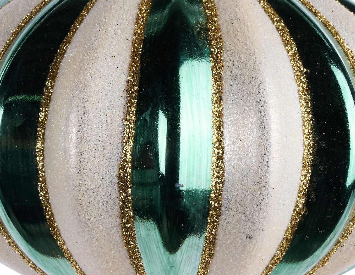 This is an up close view of this specific ornament. The Sage Green stripes are reflective while the Cream and Gold stripes have glitter.