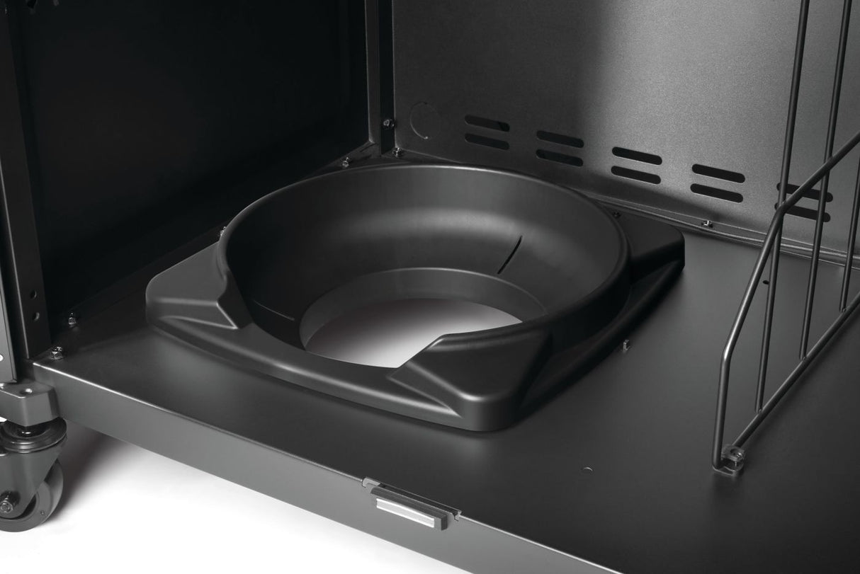 This is an up close view of the inside of the grill cabinet. This is where you can put the propane tank.