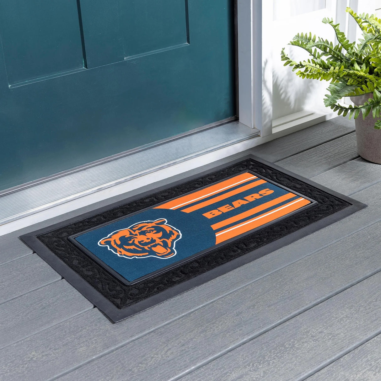 A blue and orange welcome mat with the Chicago Bears logo.