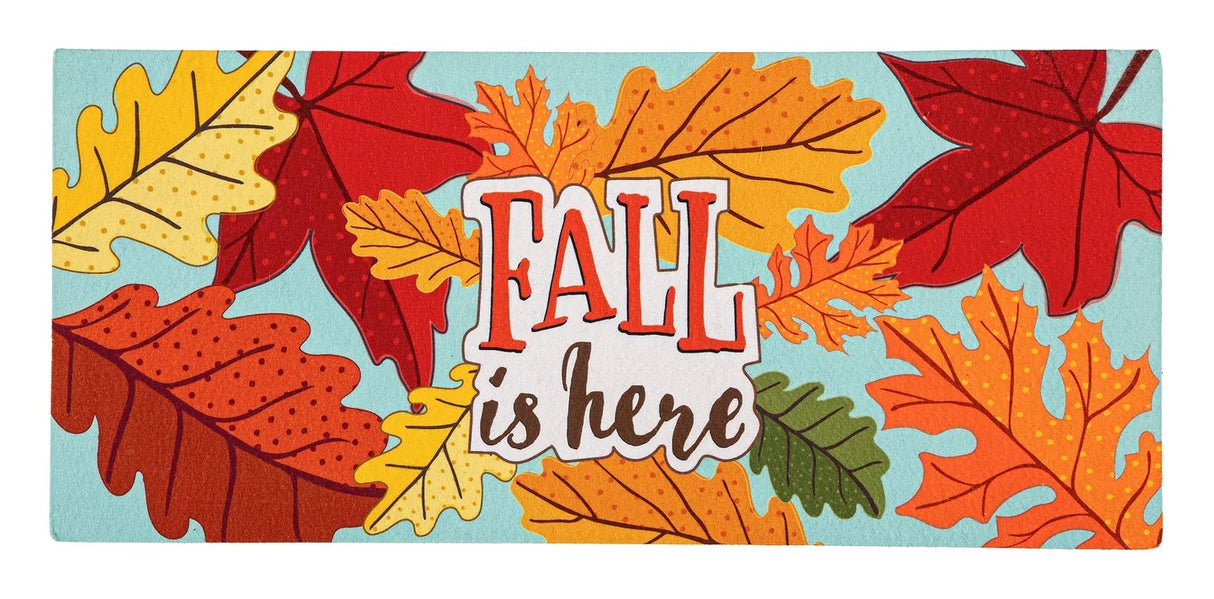 Light blue welcome mat that reads "Fall is here." There are yellow, orange, red and green leaves.
