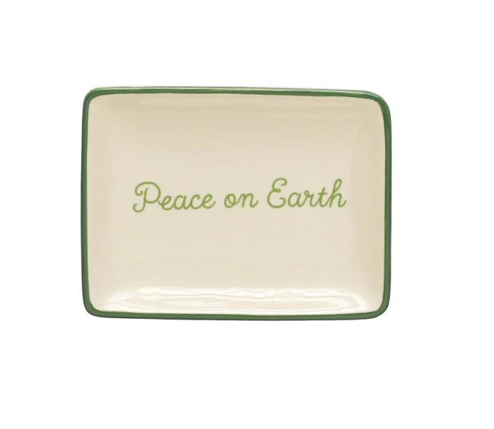 Decorative stoneware dish. This dish reads "Peace on Earth" and has a green border.