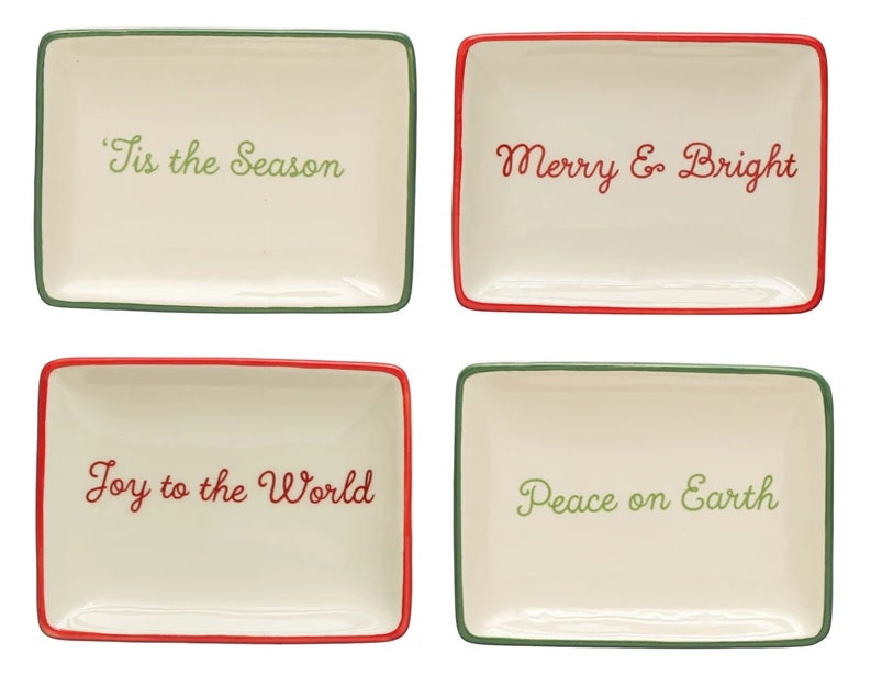 Decorative stoneware dish. One dish reads "Tis the Season" and has a green border. One dish reads "Merry & Bright" and has a red border. One dish reads "Peace on Earth" and has a green border. One dish reads "Joy to the World" and has a red border.