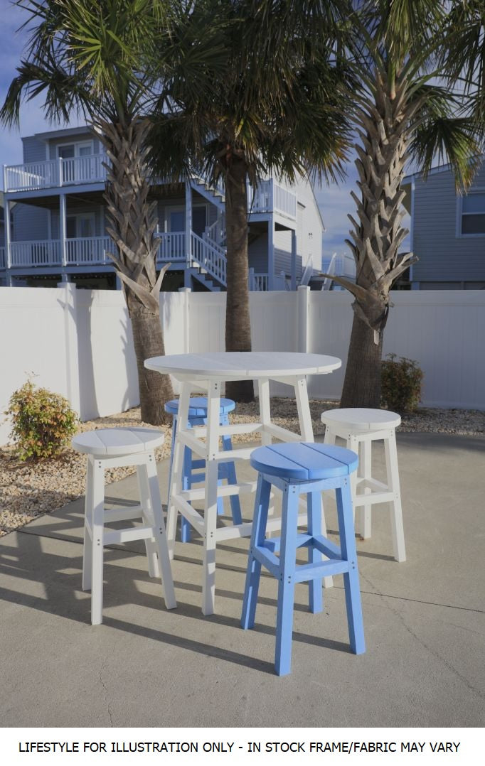 A counter height pub table with four backless stools in an exotic-looking location