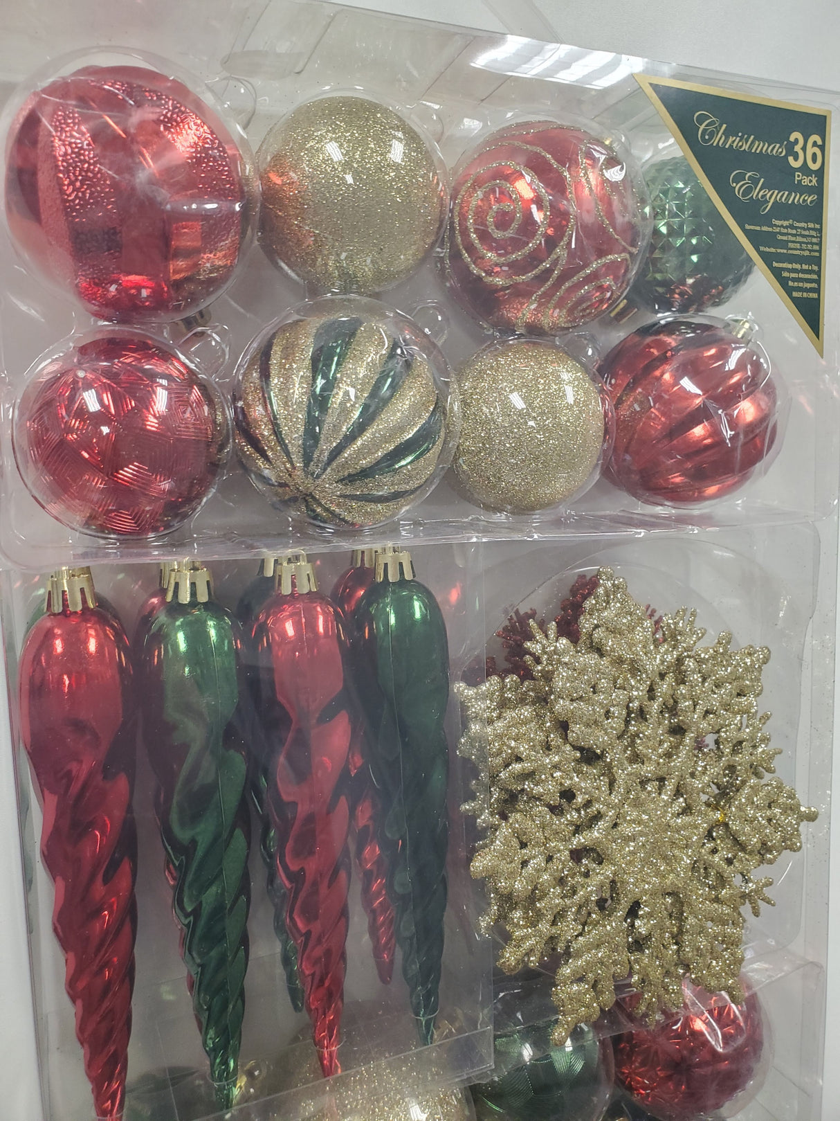 Set of 36 ornaments. One set features all Red ornaments in different sizes, shapes and textures. One set features Red and Gold ornaments in different sizes, shapes and textures. One set features Red, Green and Gold ornaments in different sizes, shapes and textures.