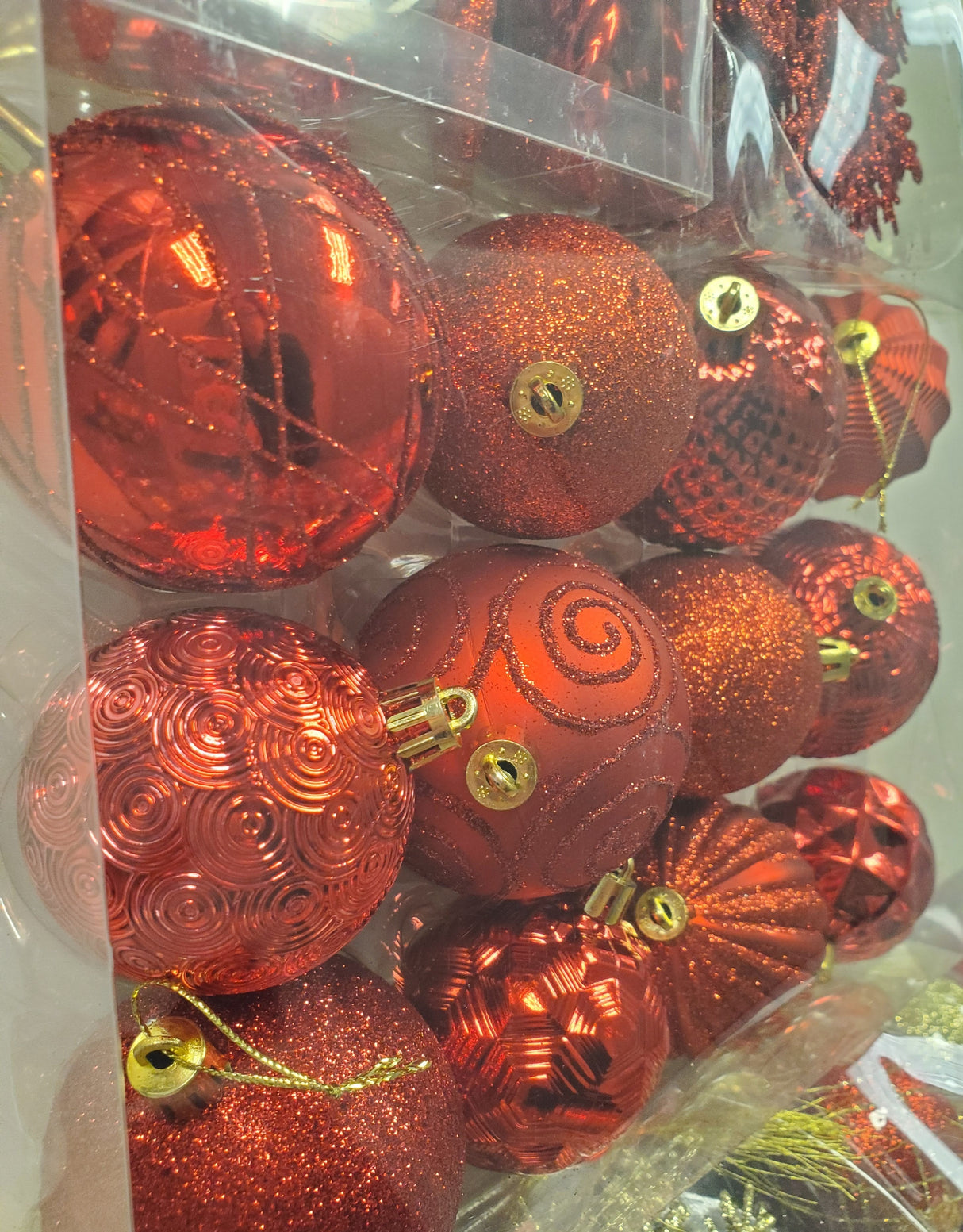 Set of 36 ornaments. One set features all Red ornaments in different sizes, shapes and textures. One set features Red and Gold ornaments in different sizes, shapes and textures. One set features Red, Green and Gold ornaments in different sizes, shapes and textures.