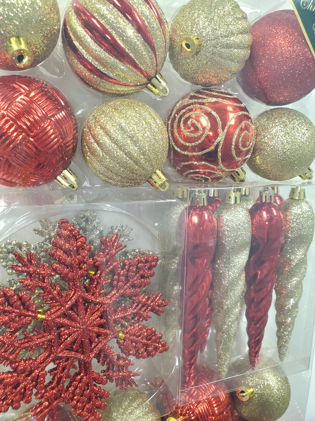 Set of 36 ornaments. One set features all Red ornaments in different sizes, shapes and textures. One set features Red and Gold ornaments in different sizes, shapes and textures. One set features Red, Green and Gold ornaments in different sizes, shapes and textures.