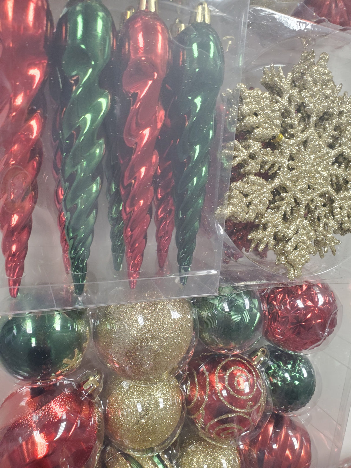 Set of 36 ornaments. One set features all Red ornaments in different sizes, shapes and textures. One set features Red and Gold ornaments in different sizes, shapes and textures. One set features Red, Green and Gold ornaments in different sizes, shapes and textures.