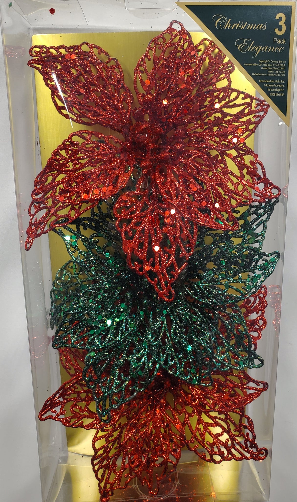 Clip on ornaments. One set of three features all red poinsettias. One set of three feature two red poinsettias and one green poinsettia. One set of three features two red poinsettias and one gold poinsettia. One set of three features one red, one gold and one green poinsettia.