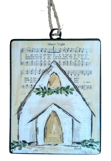 Each ornament features a background printed with sheet music; there are two options. One ornament has the sheet music for "Oh Holy Night" and a chapel with a garland at the steeple. One ornament has the sheet music for "Silent Night" and a chapel with a wreath at the steeple.