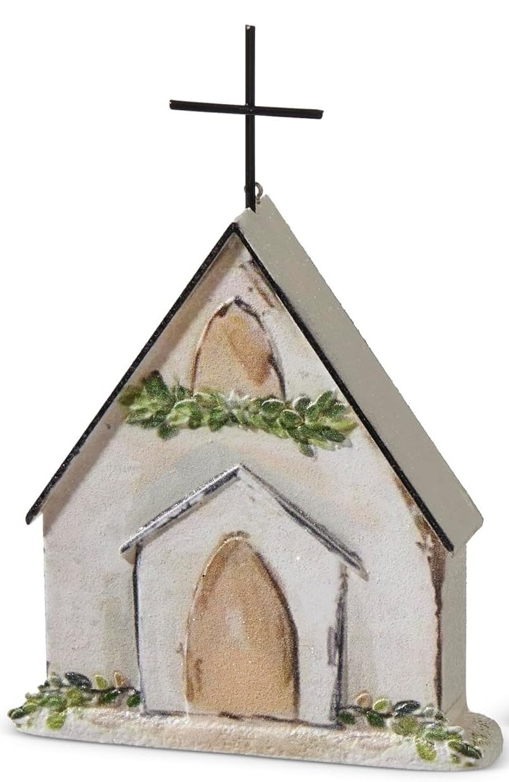 Ornament shaped like a church. One church features a wreath near the steeple. One church features a garland near the steeple.