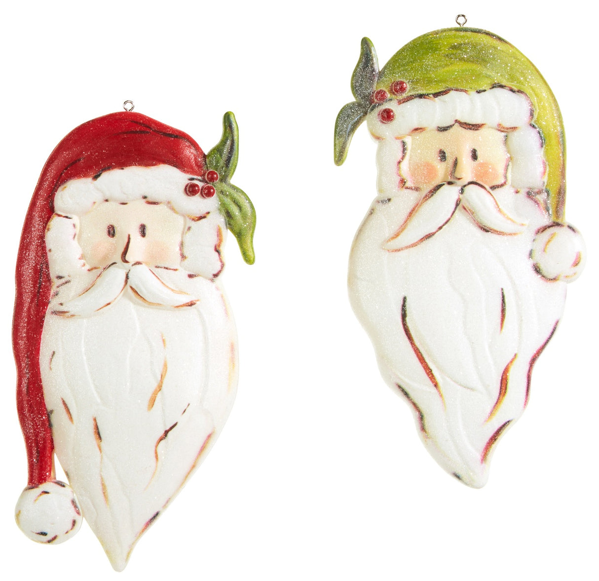 Santa Claus head ornament. One is wearing a red Santa hat and one is wearing a green Santa hat.
