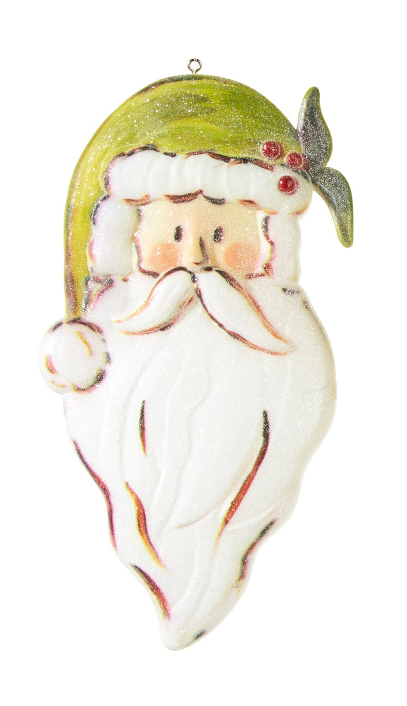 Santa Claus head ornament. One is wearing a red Santa hat and one is wearing a green Santa hat.
