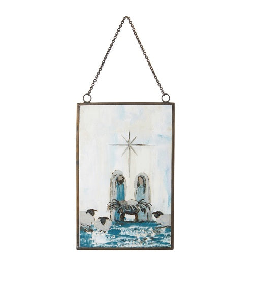 Christmas ornament with a painted Nativity Scene on it. Designed to look like stained glass.