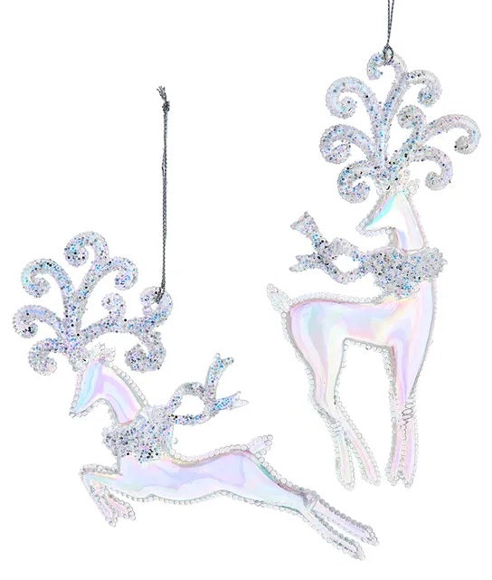 Shiny opalescent deer ornaments covered in glitter. One is standing and one is jumping.