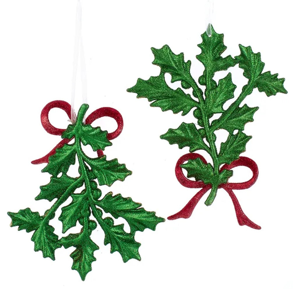 Holly leaf ornament. Sparkling green glittered holly leaf branches and berries. Accented with a vibrant red, glittered bow for added charm.
