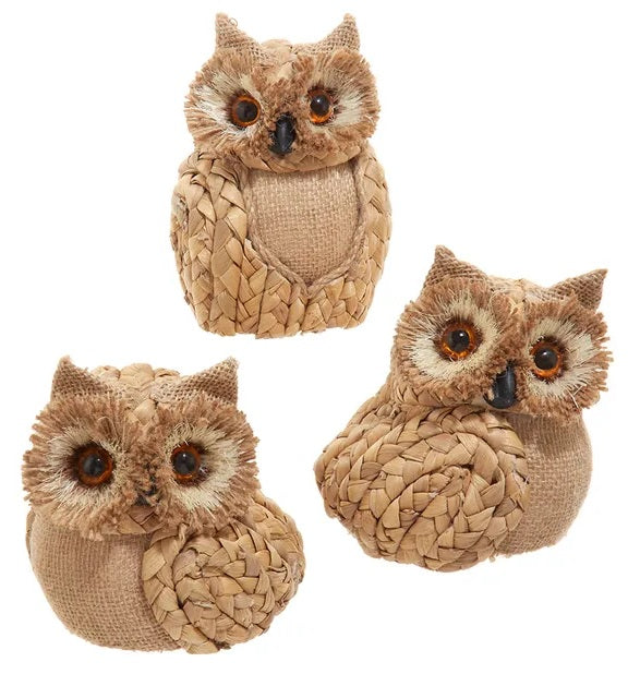 Ornament shaped like an owl with big, brown eyes.