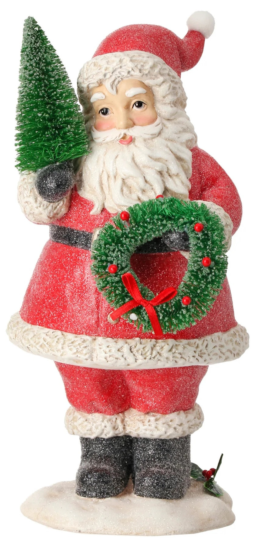 Ornament shaped like Santa Claus holding a small tree and a small, decorated wreath.